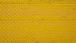 © Pawina - Urban yellow brick wall with a decorative horizontal pattern, city, building, horizontal