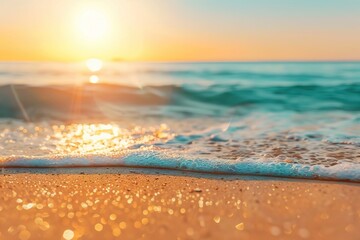 Wall Mural - Tropical beach at sunset with sparkling ocean water.