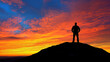 © Best stock for all - Silhouette of a man standing on top of a mountain against a colorful sunset sky, high-resolution photography