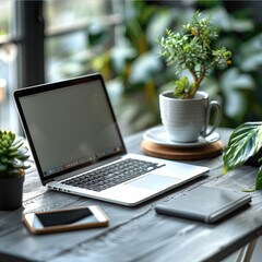 Poster - A bright and refreshing desk with a laptop and smartphone on the table, a notebook and a cup of coffee next to it, a leisurely balance between work and life.
