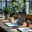 © visoot - A bright and refreshing desk with a laptop and smartphone on the table, a notebook and a cup of coffee next to it, a leisurely balance between work and life.