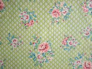 Wall Mural - Pink flowers on green base fabric