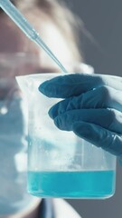 Aufkleber - A diligent researcher conducts a detailed experiment with vibrant blue liquid in a test tube, showcasing the fascinating world of scientific inquiry that drives progress in technology and innovation