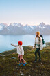 © EVERST - Mother and child travel hiking in mountains of Norway family adventure trip in the wild nature, healthy lifestyle activity vacations outdoor, woman and kid enjoying Lyngen Alps and fjord view