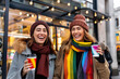 © Degimages - LGBTQ Couple on a during the winter, A queer couple holding hands and enjoying a sunny winter day