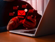 © tete_escape - SMS or email spam, fake text message phishing from scammer concept. Many red envelope with system hacked warning alert icon, scam malware spreading virus on message showing on mobile phone in hand.