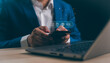 © otello-stpdc - A Businessman using a Mobile phone touching the screen to check Chat message icons, email contact address, call phone, website internet, and social media. internet technology online business concept.