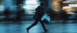 © Ps_Studio21 - A person rushing through a busy urban space.