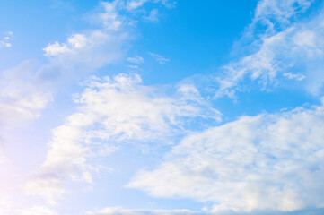 Wall Mural - sunset sky background, scenic cumulus white clouds in the picturesque sunset sky, sunset sky landsca