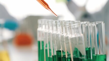 Poster - laboratory researcher develop new medicine or cure use colorful chemical liquid in lab tube. technol