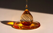 © Mohuakeya - Golden Oil Drop with Artistic Lines.A close-up of a golden oil drop with elegant diagonal lines, suspended above a reflective surface.