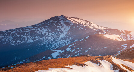 Wall Mural - the morning freshness of the spring mountains on the slopes of which the snow is melting. carpathian