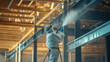 © SB4 GM - Specialist in protective suit spraying fireproof coating on steel beams inside a new building - Safety-focused and proactive, natural light