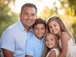 © Ishika - happy family portrait with children enjoying a sunny day