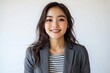 © Ganesha88 - Young Japanese woman in business casual attire, smiling and looking directly at the camera with confidence against  Portrait of a professional office worker  confident young entrepreneur on isolated