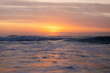 Wall Mural - beautiful colorful dawn sky over the beach.