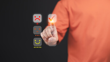 Fototapete - Customer hand touch a digital rating interface, selecting a one-star rating with a sad face icon. This concept illustrates customer dissatisfaction, feedback, and the importance of user experience.