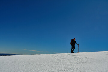 Wall Mural - man on ski climbing snow patagonia chile touring top backcountry cornice