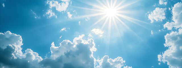 Poster - A bright blue sky filled with sunlight breaking through fluffy clouds, creating a cheerful and uplifting atmosphere for lifestyle.