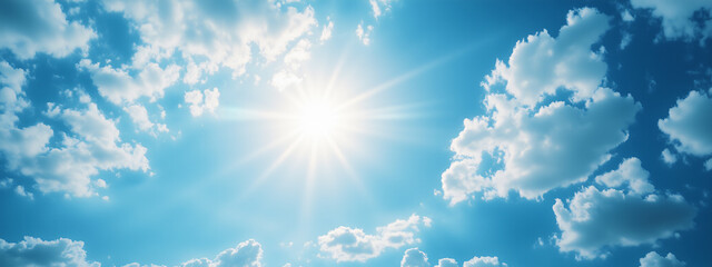 Poster - A bright blue sky with the sun shining through fluffy clouds, creating a warm and inviting atmosphere for lifestyle.