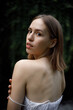 © pavelvozmischev - An Elegant and Captivating Portrait of a Beautiful Young Woman Surrounded by Natures Splendor