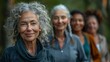 © Z A C - A group Of women likely in their 60s or 70s walking together Outdoors.