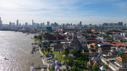 Wall Mural - Aerial pagoda at Wat Arun buddhist Temple of dawn a tourist landmark with Chao Phra Ya river