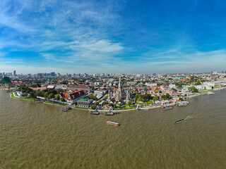 Wall Mural - Aerial pagoda at Wat Arun buddhist Temple of dawn a tourist landmark with Chao Phra Ya river