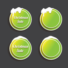 Wall Mural - Christmas vector green glossy buttons set isolated on grey background. Web green christmas sale buttons with snow, snow flakes, ice border