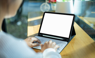 Poster - Woman use tablet and  looking at it, Blank screen tablet with white background for advertising text, Woman using tablet contact business search information, Marketing and creative design.