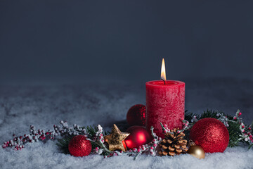 Wall Mural - christmas advent candle - blank greeting card - red candle with xmas decoration and dark blue backgr