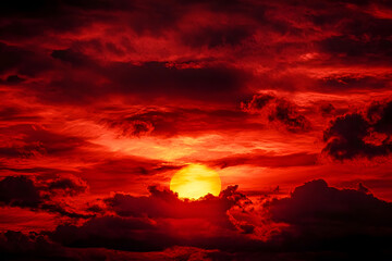 Canvas Print - Bright red sunset. Dramatic evening sky with clouds. Fiery skies with space for design. Magic fantasy sky. War, battle, terror, world apocalypse, horror concept.