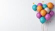 © TimelessClicks - A photostock of colorful party balloons in various sizes, floating against a white background, cheerful and celebratory. High Quality