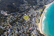 © AmazingAerialAgency - Aerial view of beautiful coastal town of Lorne with beach and ocean waves, Victoria, Australia.