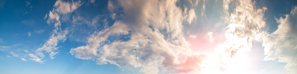 Wall Mural - cloudy sky at sunset. cloudy sky background. horizontal banner