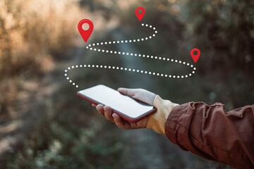Tourist using navigation app on the mobile phone.