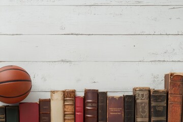 Aufkleber - A variety of books from different genres is lined up on a white surface, with a basketball on the left, creating an intriguing display. Generative AI