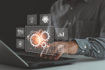 Fototapete - RPA Robotic process automation innovation technology concept. Intelligent system automation. AI. Artificial intelligence. Businessman working on a laptop computer using digital RPA interface.