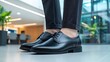 © nilawan - Elegant business shoes modern office environment fashion focus professional style visual appeal