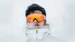 © Mariana Mejia - Snowboarder wearing orange goggles exhaling on snowy mountain
