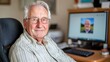 © NadenDesign - Cozy portrait of an elderly man using a computer at home intimate technology reflection