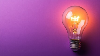 Poster - Bright Bulb Illuminating a Purple Background, Showcasing the Warm Glow and Unique Design of a Vintage Light Bulb for Creative and Inspirational Use
