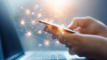 Poster - A person holds a smartphone while interacting with a laptop, surrounded by digital connections and glowing particles representing technology and communication.