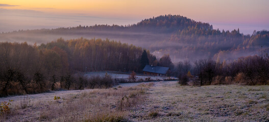 Wall Mural - frosty and misty sunrise in the autumn mountains of southern poland