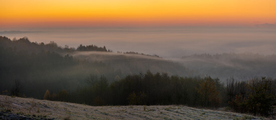 Wall Mural - frosty and misty sunrise in the autumn mountains of southern poland