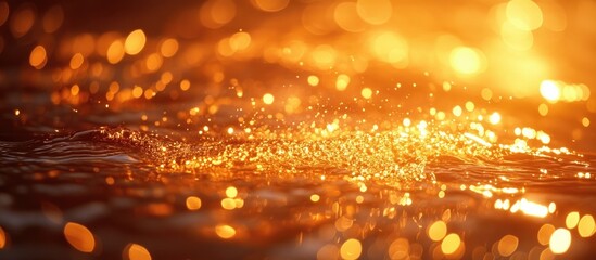 Poster - Golden Bokeh Abstract Background with Sparkling Light Reflections in Warm Tones