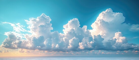Poster - Expansive clouds illuminated by soft sunlight against a serene blue sky creating a tranquil atmosphere suitable for various designs