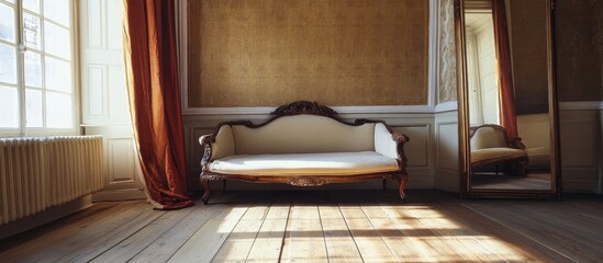 Poster - Vacant living room with antique single sofa mirror panels and wooden flooring in warm natural light