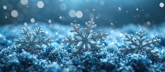 Poster - Winter scene featuring sparkling snowflakes resting on a shimmering blue surface with a soft bokeh effect creating a magical ambiance.