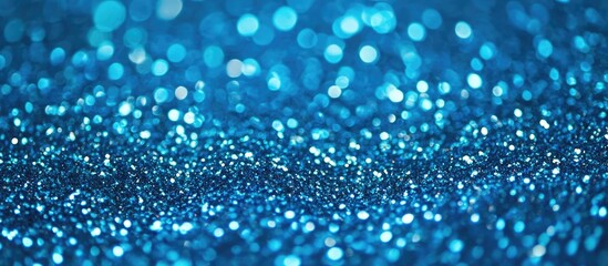 Poster - Sparkling blue glitter background for festive and creative designs with a vibrant bokeh effect suitable for various applications